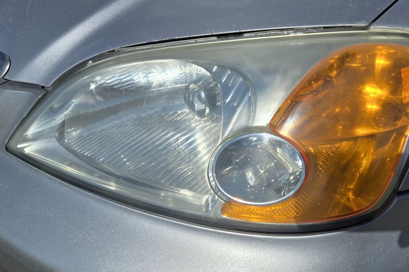 Oxidized headlight before restoration at NS Auto Glass Grande Prairie