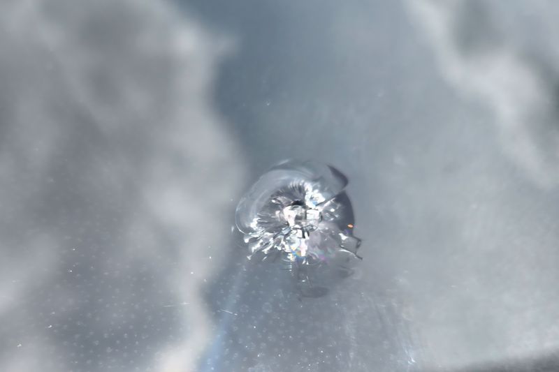 Stone chip in a windshield before repair at NS Auto Glass Grande Prairie